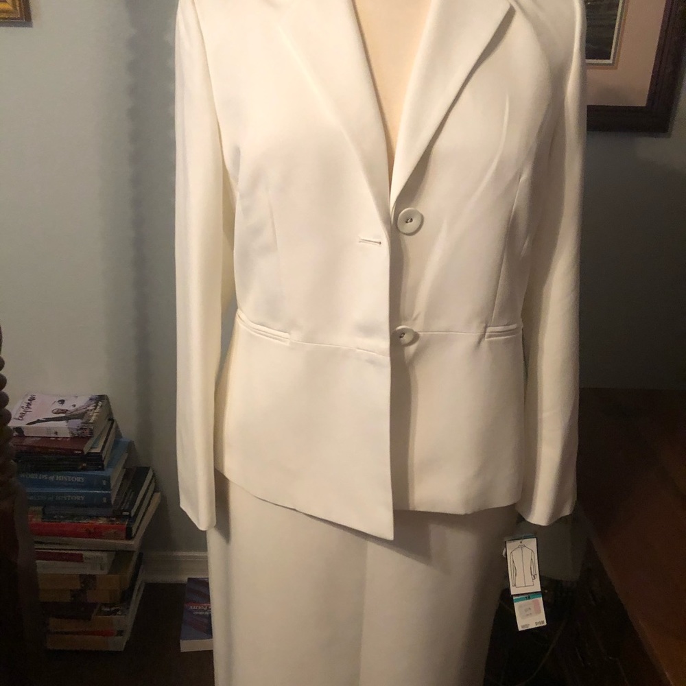 White business suit. Jacket and skirt